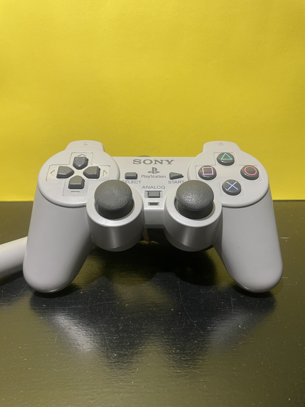 PS1 DUALSHOCK GRIS
